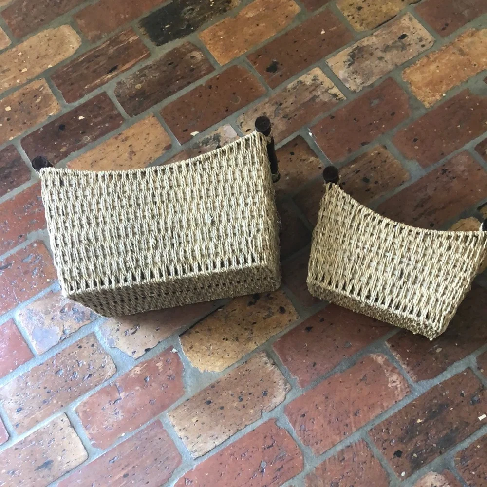 2 Wicker storage baskets with wooden handles
